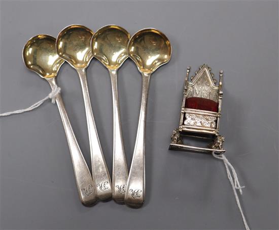 A George V silver miniture coronation chair pin cushion and a set of four George III silver mustard spoons, London, 1805.